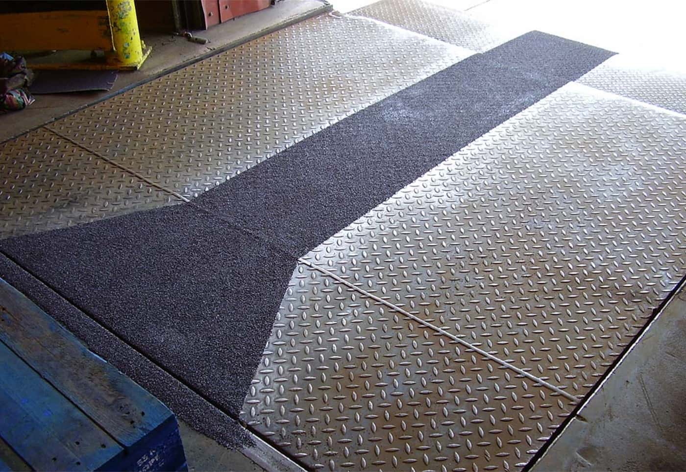 Plant walkway resurfaced with an anti-slip safety floor by AAS