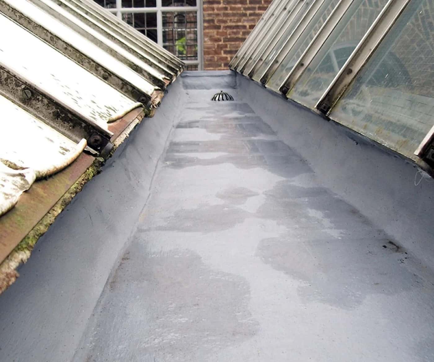 Cold liquid roof membrane applied by AAS over an existing mill roof