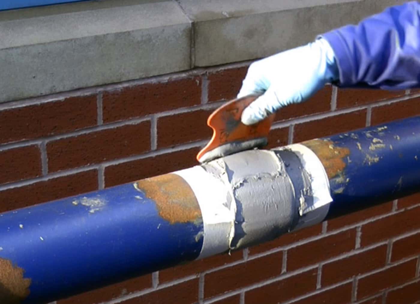 Transformer radiator bank with weeping oil leak sealed and coated by AAS