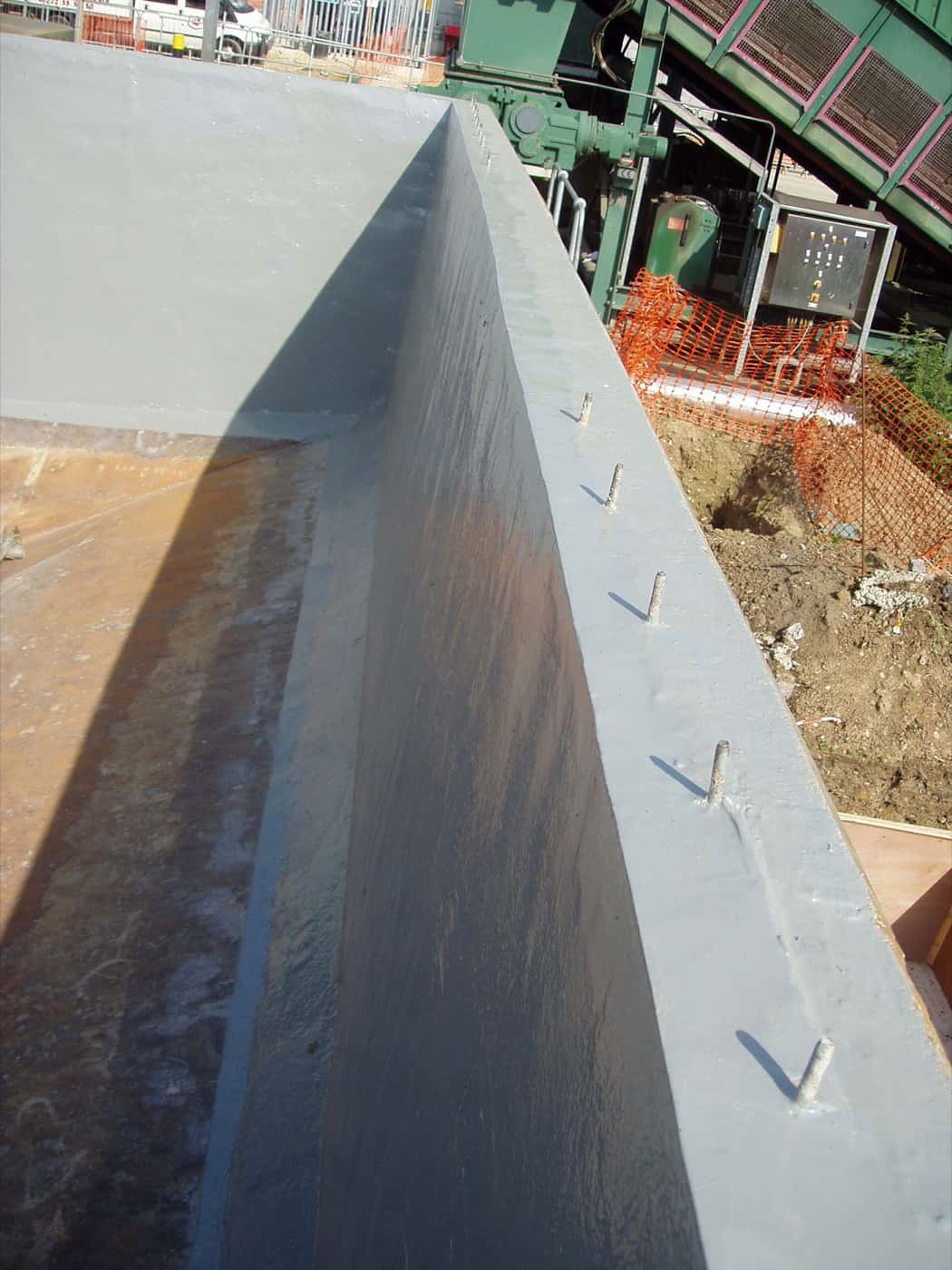 Potable water tank interior blasted, rebuilt, and lined for drinking-water contact by AAS